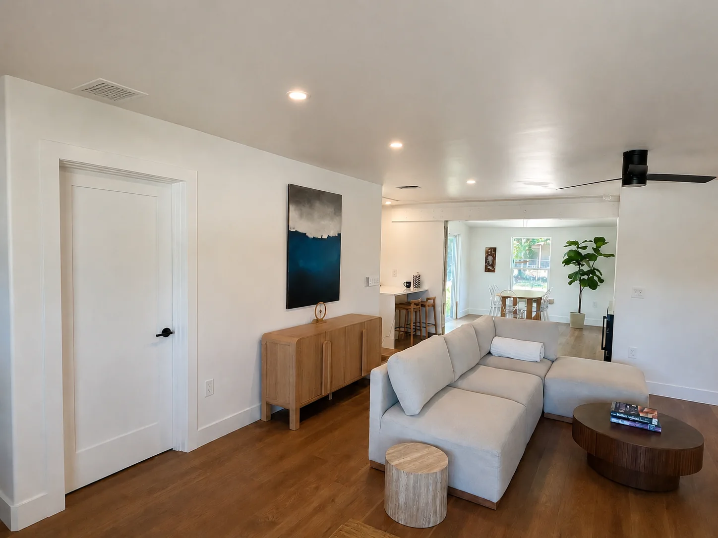 Finished living room and dining room with clean lines